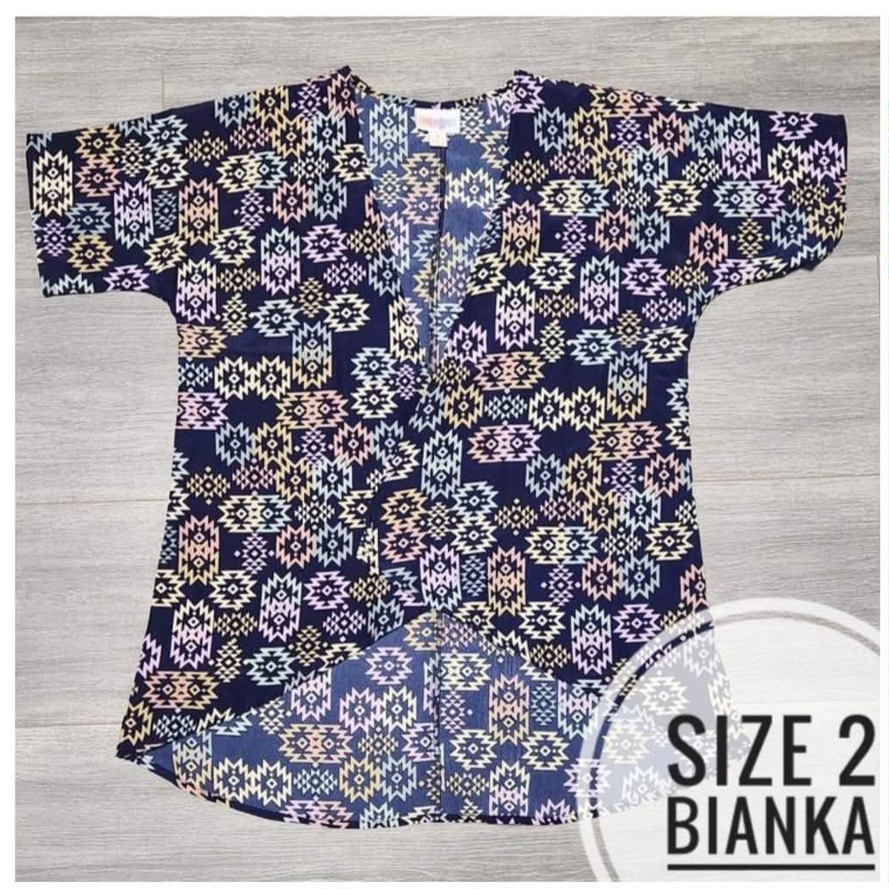 LuLaRoe Blue and Pink Cover with Circular Pattern